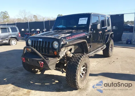 2008 Jeep Wrangler Unlimited Rubicon из США, поврежденный, VIN 1J4GA69138L614197